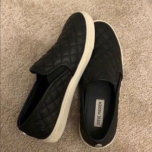 Black Steve Madden slip ons